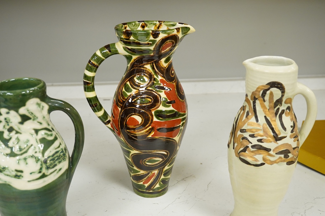 Nicola Tassie (b.1960), Three jugs and a slipware bowl, each signed to the bases, largest 28cm high